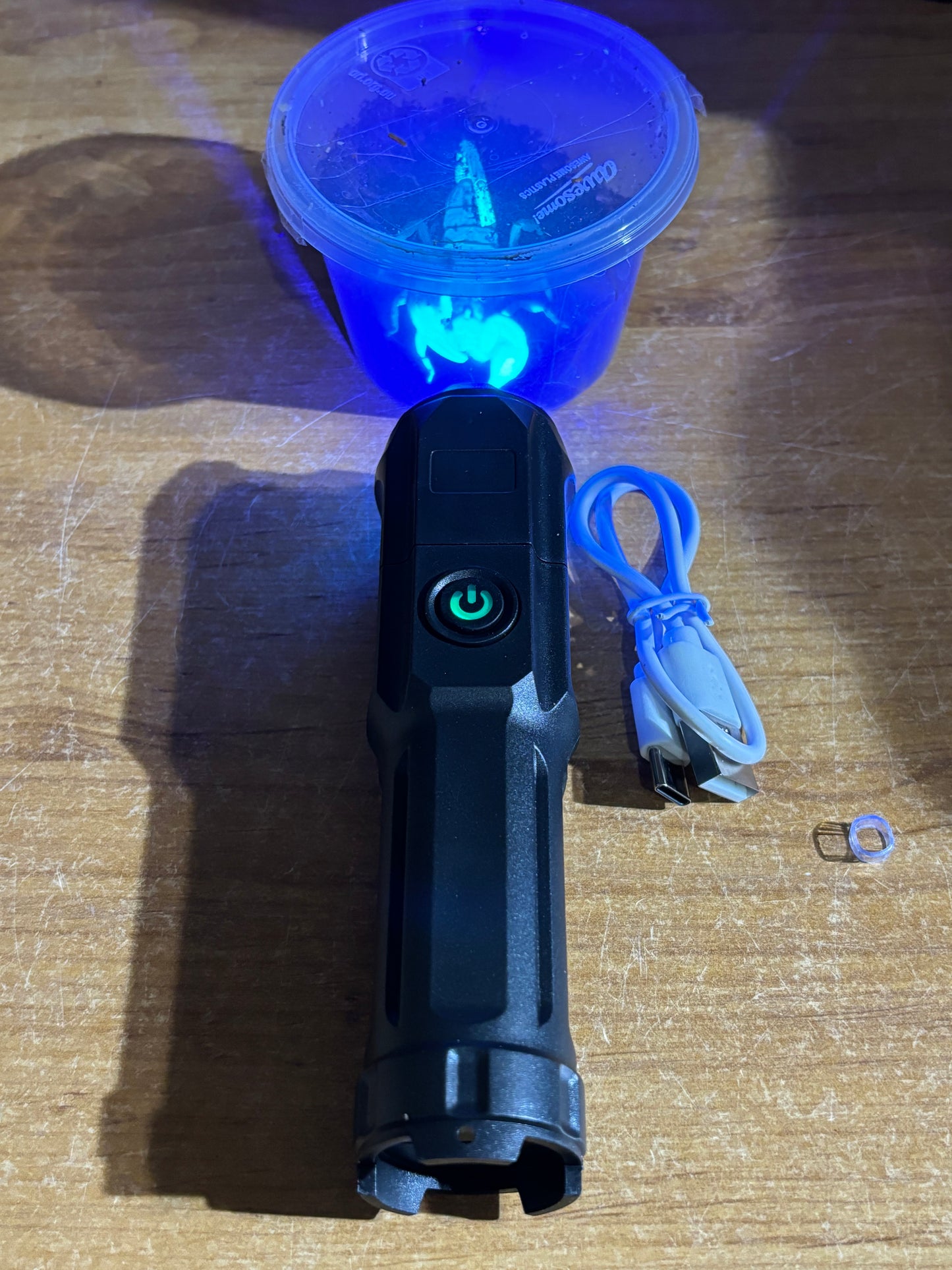 Uv torch with usb recharger .